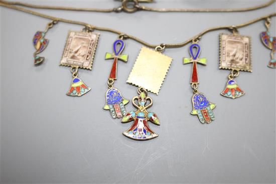 A white metal and enamel locket, a gilt metal and enamel necklace, two pendants, a brooch and 830 bug brooch, locket 24mm.